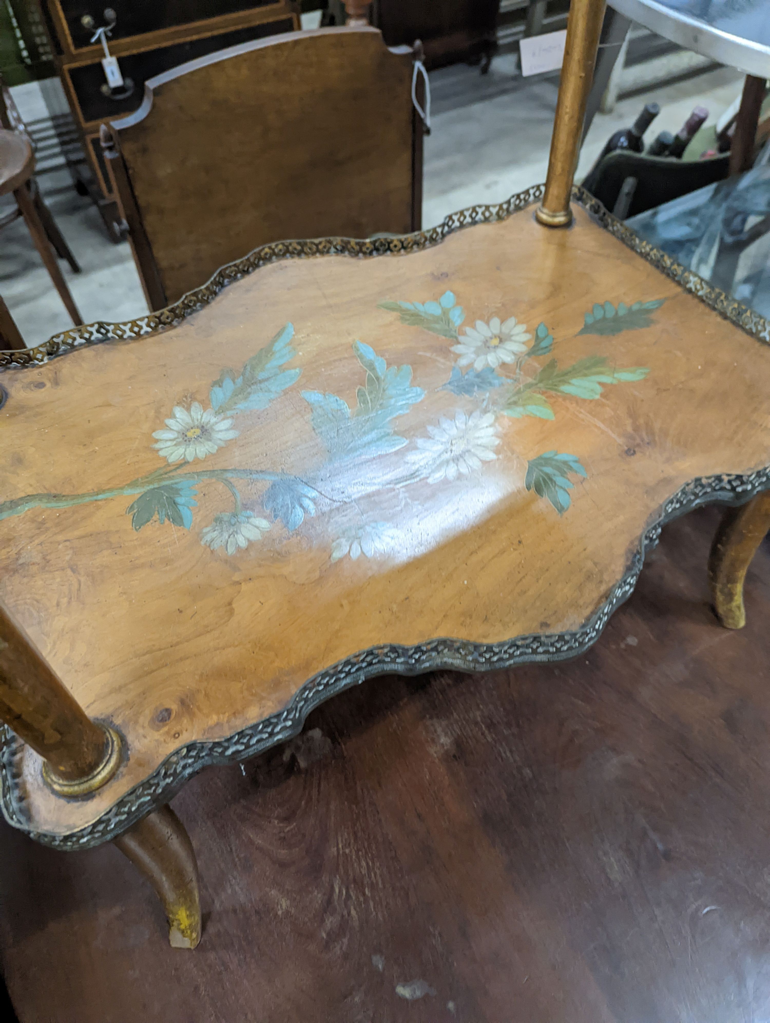 A late Victorian two tier walnut etagere, painted with birds amongst flowers, width 58cm, depth 43cm, height 74cm